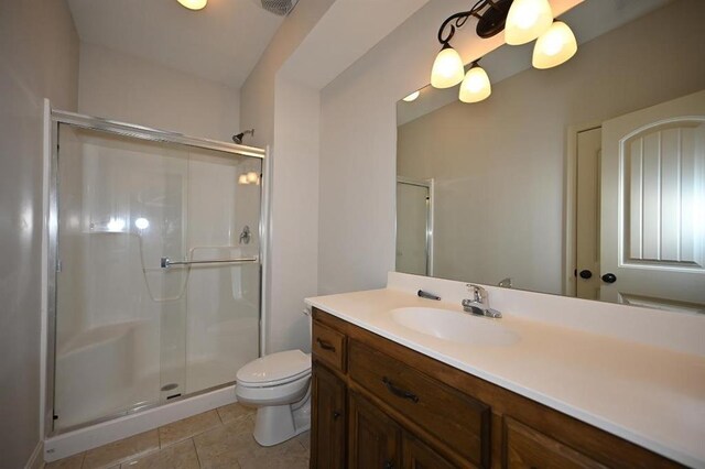 15790 NW 125th St, Platte City, MO 64079 - full bathroom with a stall shower, toilet, vanity, and tile patterned floors