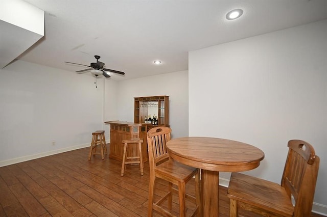 15790 NW 125th St, Platte City, MO 64079 - dining space with wood finished floors, a ceiling fan, a dry bar, recessed lighting, and baseboards