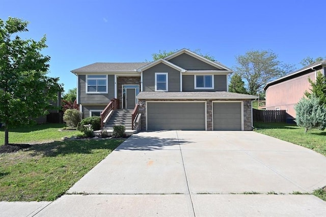 15790 NW 125th St, Platte City, MO 64079 - bi-level home featuring an attached garage and driveway
