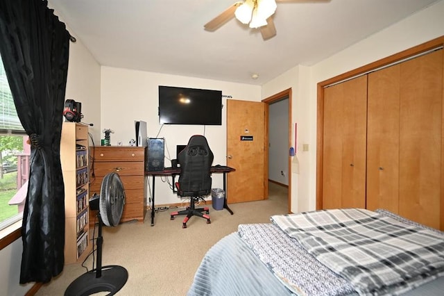 705 N Clark St, Edgerton, MO 64444 - carpeted bedroom with a closet and ceiling fan