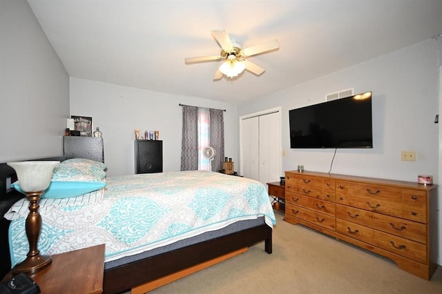 705 N Clark St, Edgerton, MO 64444 - carpeted bedroom with a closet and a ceiling fan
