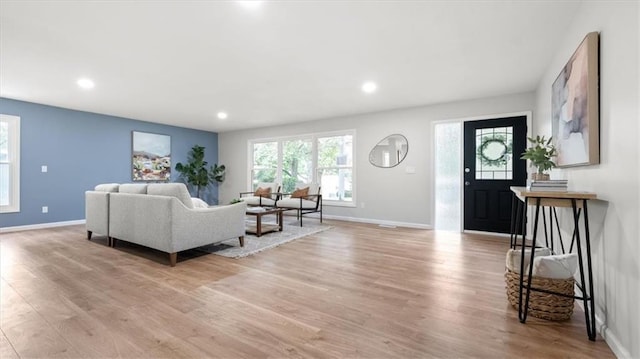8741 Reeds Rd, Overland Park, KS 66207 - living area featuring light wood-style flooring, baseboards, and recessed lighting