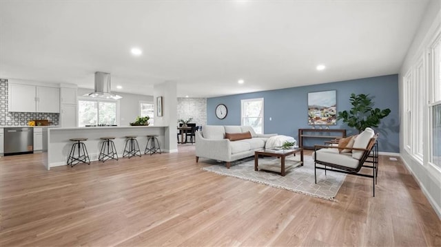 8741 Reeds Rd, Overland Park, KS 66207 - living room with recessed lighting, light wood-style flooring, and baseboards