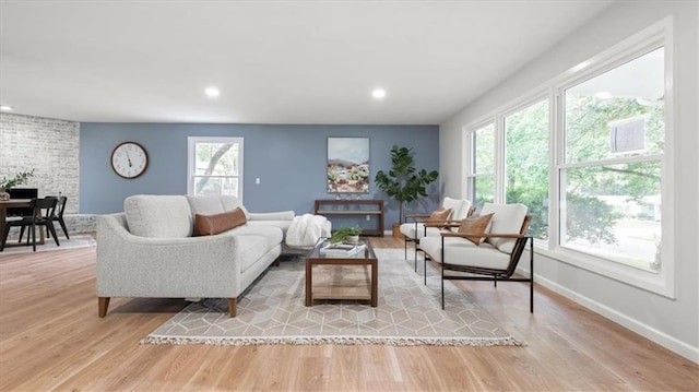 8741 Reeds Rd, Overland Park, KS 66207 - living area with recessed lighting, light wood-style floors, and baseboards