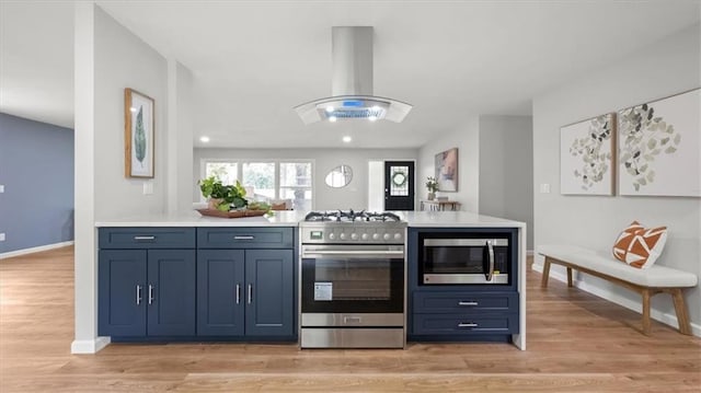 8741 Reeds Rd, Overland Park, KS 66207 - kitchen featuring appliances with stainless steel finishes, exhaust hood, light countertops, baseboards, and recessed lighting