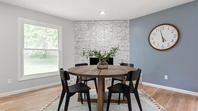 8741 Reeds Rd, Overland Park, KS 66207 - dining space with light wood-type flooring and baseboards