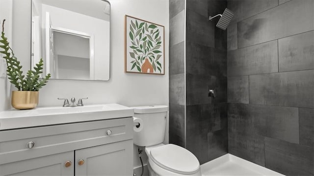 8741 Reeds Rd, Overland Park, KS 66207 - bathroom with toilet, vanity, and tiled shower