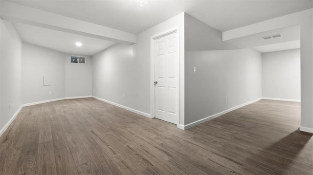 8741 Reeds Rd, Overland Park, KS 66207 - additional living space with wood finished floors, baseboards, and recessed lighting