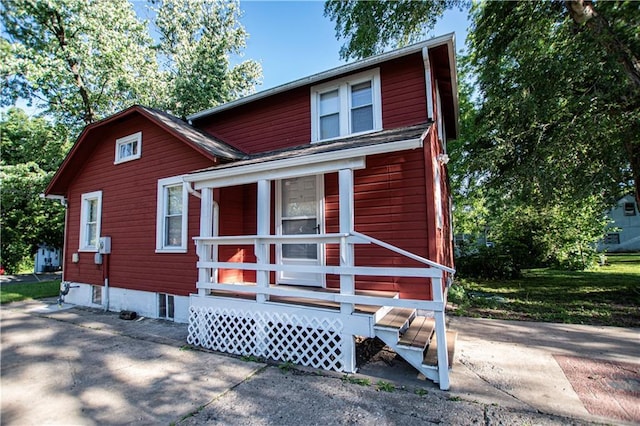 1340 S Osage St, Independence, MO 64055 - view of front of property featuring covered porch