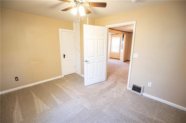 1340 S Osage St, Independence, MO 64055 - unfurnished room featuring light colored carpet, a ceiling fan, and baseboards