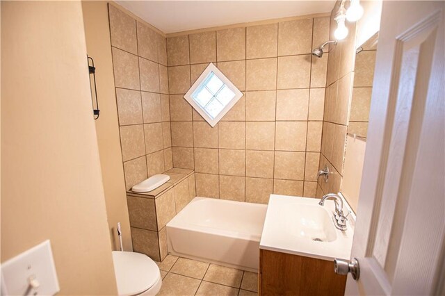 1340 S Osage St, Independence, MO 64055 - full bathroom with tile patterned flooring, vanity, toilet, and tub / shower combination