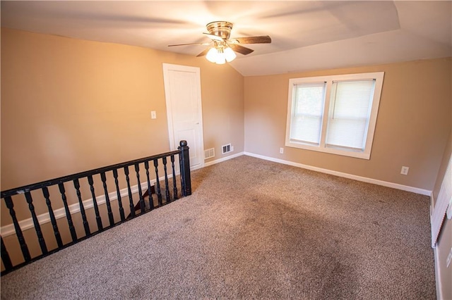 1340 S Osage St, Independence, MO 64055 - carpeted spare room featuring ceiling fan, lofted ceiling, and baseboards