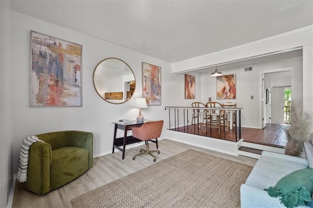 470 W 104th St Unit C, Kansas City, MO 64114 - sitting room with wood finished floors and baseboards