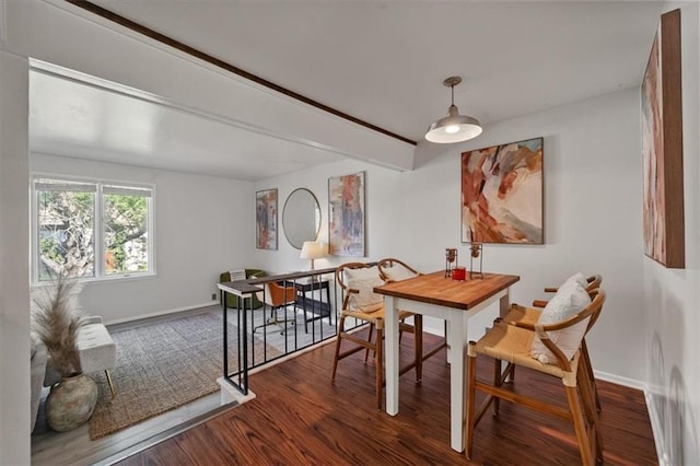 470 W 104th St Unit C, Kansas City, MO 64114 - dining area featuring wood finished floors and baseboards