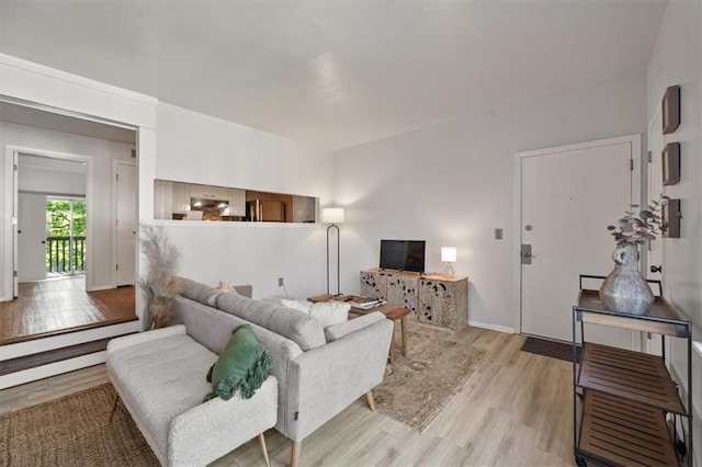 470 W 104th St Unit C, Kansas City, MO 64114 - living area with light wood-style floors