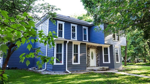 240 W 3rd Ave, Garnett, KS 66032 - view of front of property with a front yard