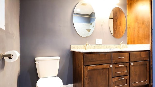 240 W 3rd Ave, Garnett, KS 66032 - full bathroom with toilet and double vanity