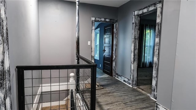 240 W 3rd Ave, Garnett, KS 66032 - corridor with wood finished floors and an upstairs landing