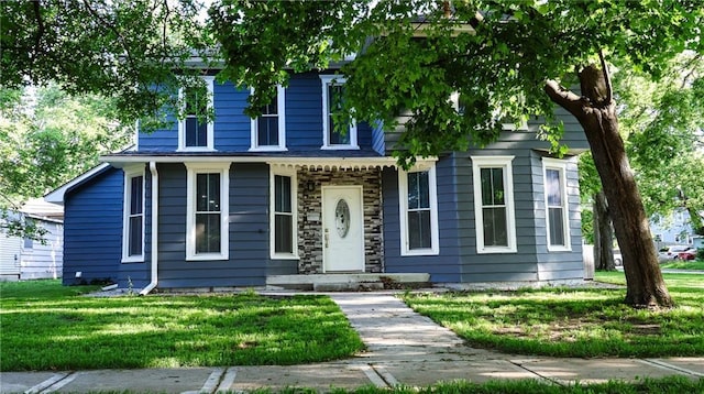 240 W 3rd Ave, Garnett, KS 66032 - view of front of property featuring a front yard