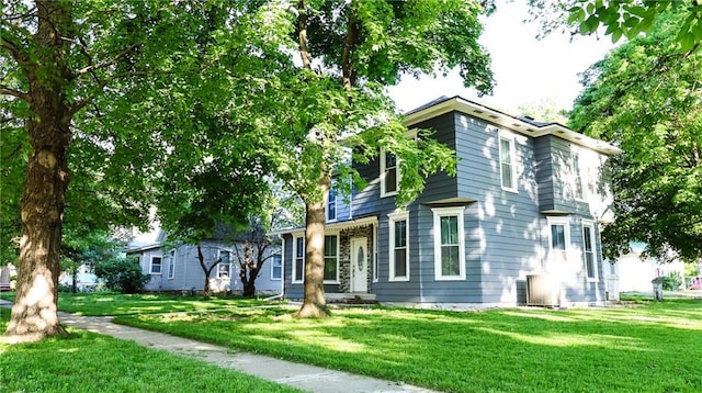 240 W 3rd Ave, Garnett, KS 66032 - view of front of home featuring a front lawn