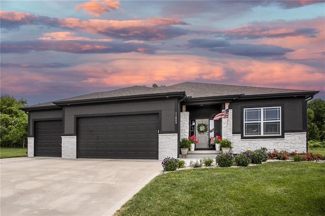 11809 E Ridgeview Ct, Peculiar, MO 64078 - prairie-style house with a garage, driveway, a lawn, stone siding, and stucco siding