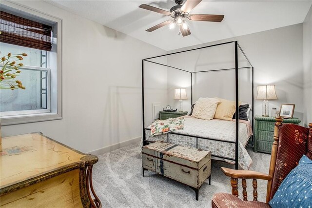 11809 E Ridgeview Ct, Peculiar, MO 64078 - carpeted bedroom featuring baseboards and a ceiling fan