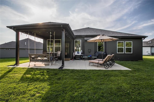 11809 E Ridgeview Ct, Peculiar, MO 64078 - rear view of property with a patio area and a yard
