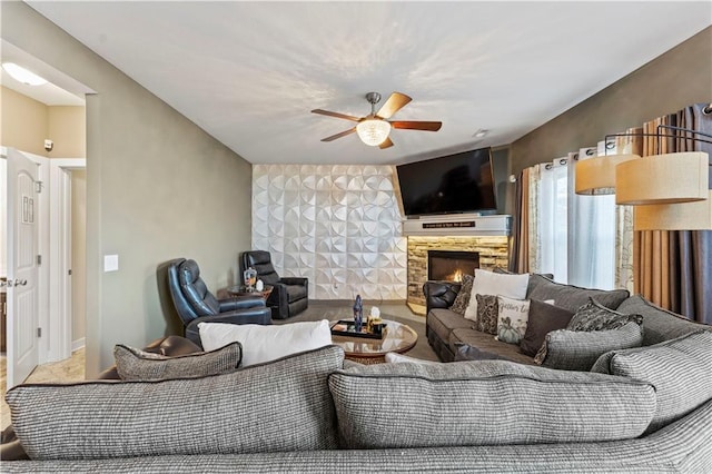4108 NW 76th St, Kansas City, MO 64151 - living area featuring ceiling fan and a fireplace