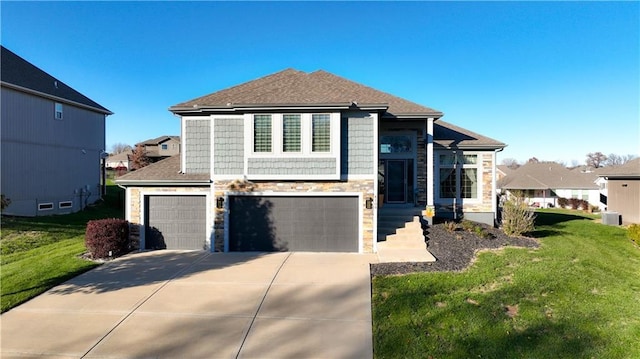 4108 NW 76th St, Kansas City, MO 64151 - view of front of house featuring stone siding, driveway, an attached garage, and a front lawn