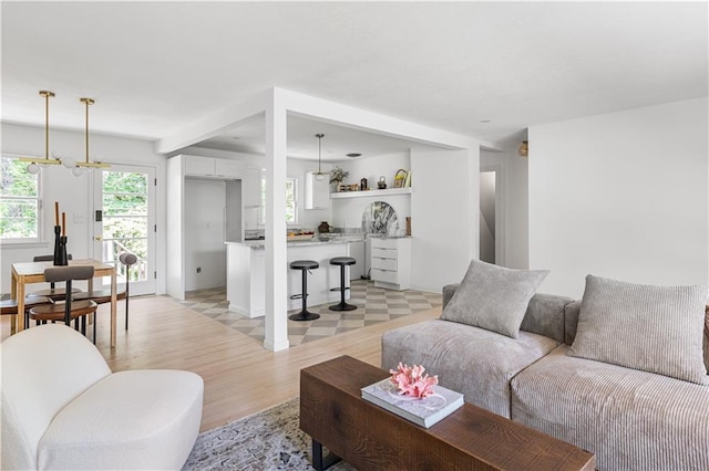 218 NW 43rd Ter, Kansas City, MO 64116 - living area with light wood-type flooring