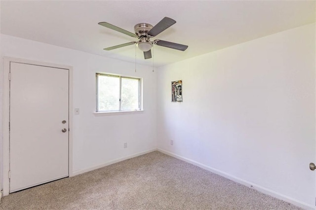 6021 E 151st Ter, Grandview, MO 64030 - empty room with carpet, a ceiling fan, and baseboards