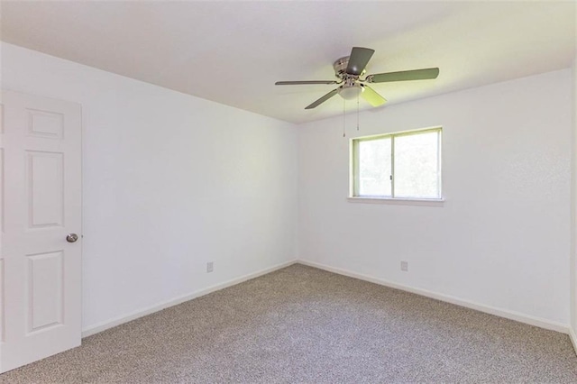 6021 E 151st Ter, Grandview, MO 64030 - unfurnished room with light colored carpet, a ceiling fan, and baseboards