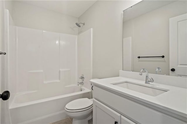 full bath with toilet, vanity, and shower / washtub combination