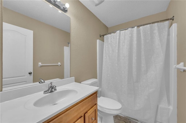 bathroom with toilet, vanity, a textured ceiling, and shower / tub combo with curtain
