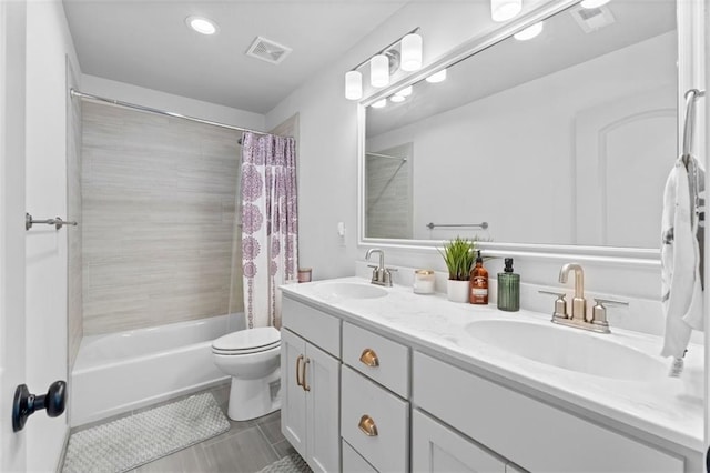 19623 W 196th Ter, Spring Hill, KS 66083 - full bath featuring shower / tub combo with curtain, double vanity, toilet, tile patterned flooring, and recessed lighting