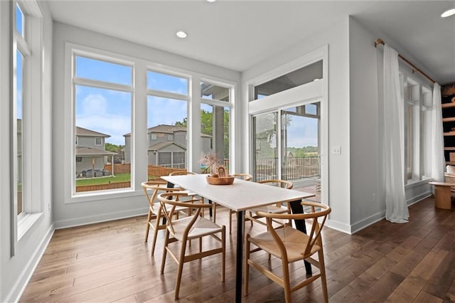15932 W 171st Ter, Olathe, KS 66062 - dining area with wood-type flooring, baseboards, and recessed lighting