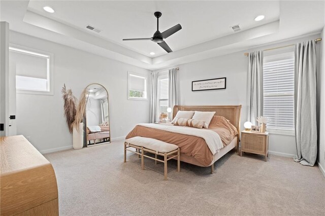 15932 W 171st Ter, Olathe, KS 66062 - bedroom featuring a tray ceiling, light carpet, baseboards, recessed lighting, and ceiling fan