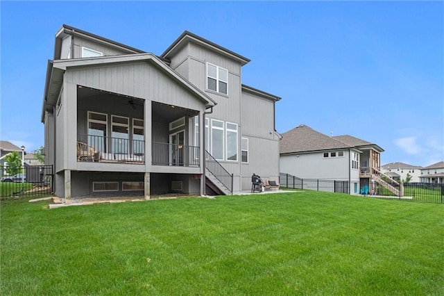 15932 W 171st Ter, Olathe, KS 66062 - back of property featuring stairway, a ceiling fan, and a sunroom