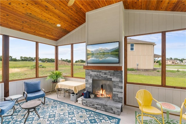 16966 S Durango St, Olathe, KS 66062 - sunroom with a fireplace, vaulted ceiling, and healthy amount of natural light
