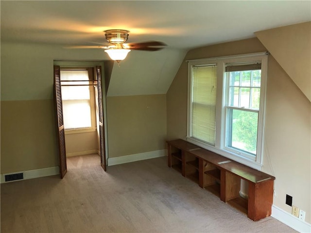 305 Linn St, Leavenworth, KS 66048 - additional living space featuring lofted ceiling, ceiling fan, baseboards, and carpet floors
