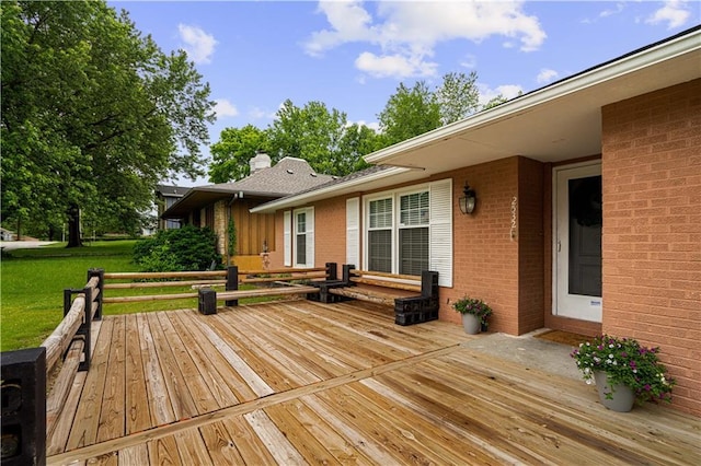 2532 N 73rd St, Kansas City, KS 66109 - wooden deck with a yard