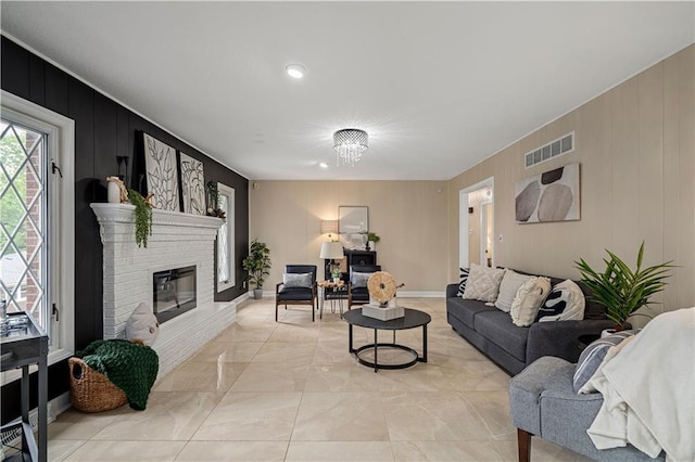2532 N 73rd St, Kansas City, KS 66109 - living area featuring a brick fireplace