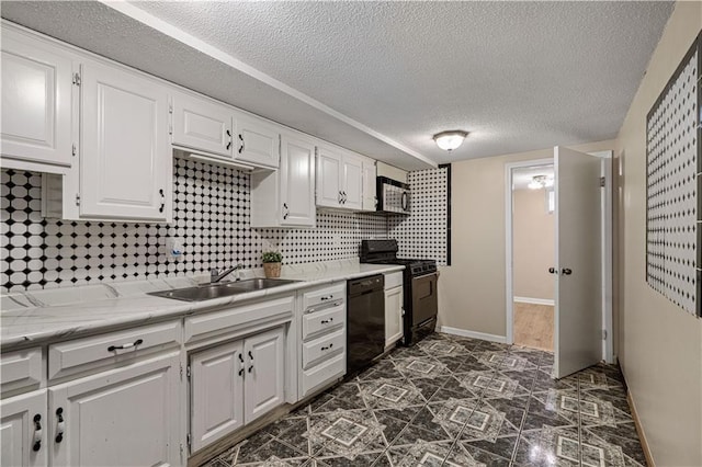 2532 N 73rd St, Kansas City, KS 66109 - kitchen featuring black appliances, a sink, white cabinetry, light countertops, and a textured ceiling