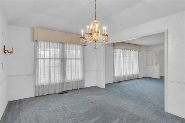 28210 Hedge Ln, Paola, KS 66071 - empty room with a chandelier and carpet floors