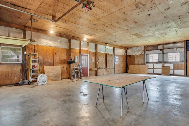 28210 Hedge Ln, Paola, KS 66071 - garage with wooden walls