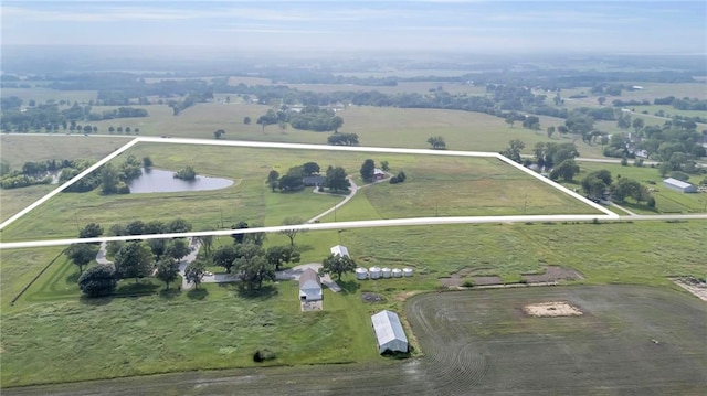 28210 Hedge Ln, Paola, KS 66071 - aerial view of property and surrounding area featuring rural landscape, property boundaries highlighted, and a pastoral area