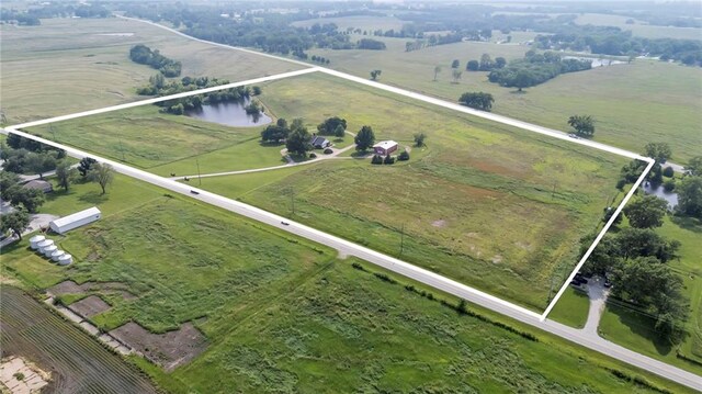 28210 Hedge Ln, Paola, KS 66071 - view of property location featuring rural landscape, property boundaries highlighted, a pastoral area, and a large body of water