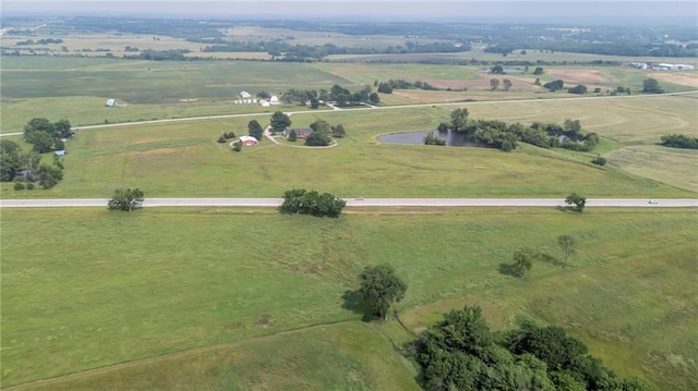 28210 Hedge Ln, Paola, KS 66071 - aerial overview of property's location featuring rural landscape, a large body of water, and a pastoral area