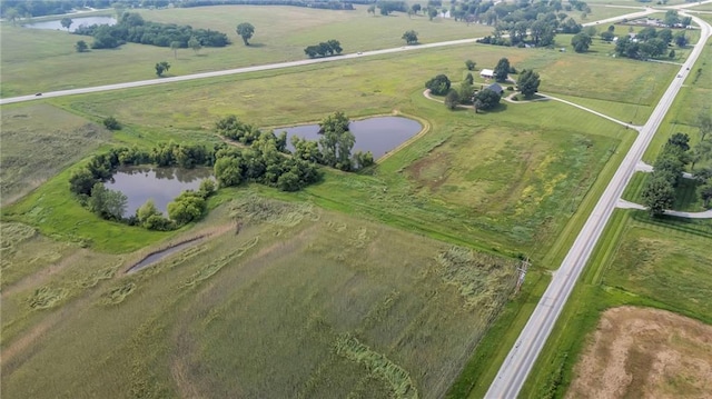 28210 Hedge Ln, Paola, KS 66071 - aerial overview of property's location with rural landscape and a large body of water