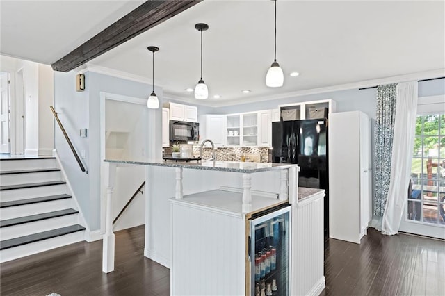 kitchen with black microwave, wine cooler, decorative backsplash, white cabinets, and dark wood-style flooring